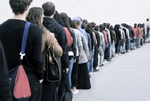 Large group of people waiting in line